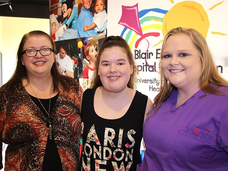 Vicksburg resident Hannah Dunaway, center, was named the 2015 Children's Miracle Network Champion for Batson Children's Hospital in Jackson during a celebration at the Marriott Courtyard in Vicksburg. She's pictured with her mom, Nicki Dunaway, left, of Vicksburg, and her longtime nurse at Batson, Ashley Arceo.